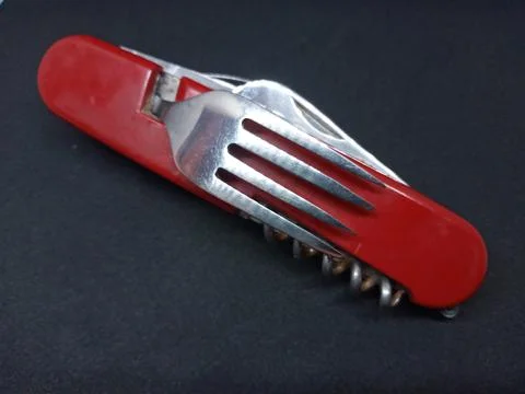 Multipurpose folding army knife Foto stock