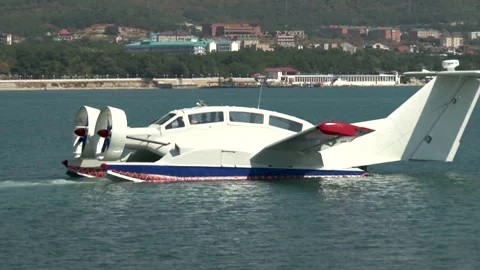 Multipurpose high-speed vessel on dynamic air cushion Oriole. Ekranoplan floats. Stock Footage 130965270