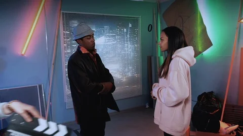 Multiracial actors burst in the laugh during the movie shooting scene Stock Footage 124336325