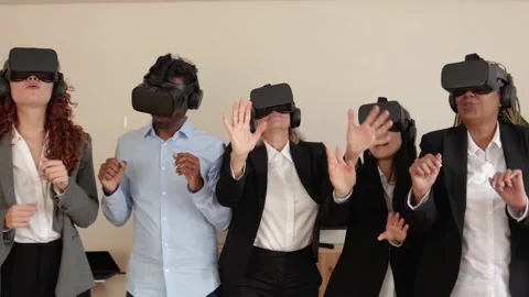 Multiracial business group having fun dancing while waring virtual reality Video stock 178588536
