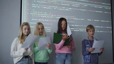 Multiracial children presenting programming project Stock Footage 142495603