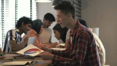 Multiracial college university students study prepare project make notes Video stock 162807645