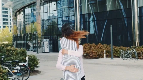 Multiracial couple having fun together while walking to the downtown Stock Footage 119423288