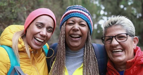 Multiracial friends having fun during trekking day into the wood Stock Footage 164377357