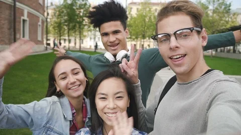 Multiracial friends vlogging in university campus. Stock Footage 101793945