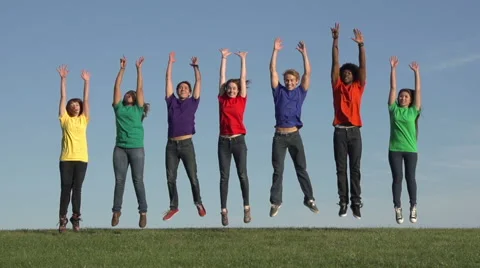 Multiracial group of 7 young people jumping up, slow motion Stock Footage 44117389