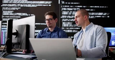Multiracial Group of Engineers Coding Software Stock Photos