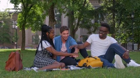 Multiracial Group of Friends with Hands in Stack, Teamwork Stock Footage 111957193