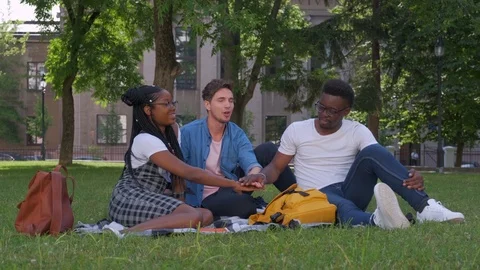 Multiracial Group of Friends with Hands in Stack, Teamwork Stock Footage 111957320