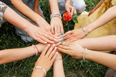 Multiracial group of friends with hands in stack. Teamwork Stock-Fotos