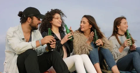 Multiracial group having a conversation with a lot of fun Stock Footage 84757314