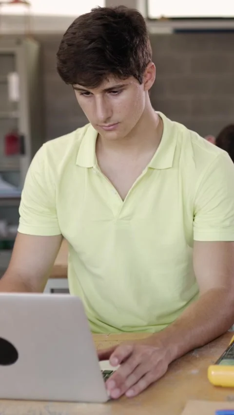 Multiracial group of high school students programming electronic circuits Stock Footage 278610917