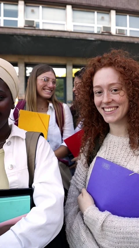 Multiracial group smiling students standing posing looking camera outside the Stock Footage 275297046