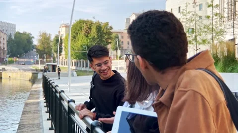 Multiracial group of students friends talk, spend time together have fun Stock Footage 262462591
