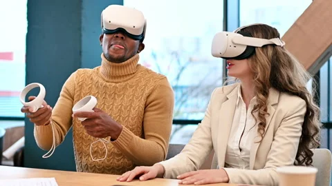 Multiracial group of workers in an office discussing business using a tablet. Stock Footage 235287600