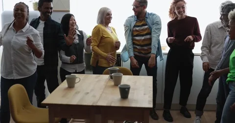 Multiracial happy friends having fun dancing at home kitchen Vídeos de archivo 172538573