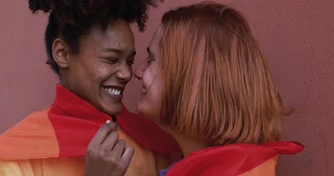 Multiracial lesbian couple having tender moment together - LGBT pride concept 動画素材 170604193