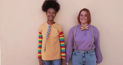 Multiracial lesbian couple smiling on camera Stock Footage 170604398