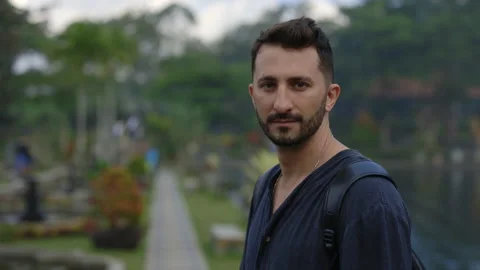 Multiracial Man Tourist Outside, Posing in the Holy Place in Bali. Handsome Stock Footage 306784637