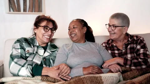 Multiracial senior friends having fun together at home in winter holidays  Video stock 252138061