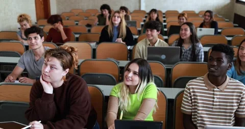Multiracial students working with laptop computers inside classroom at school Stock Footage 203723834