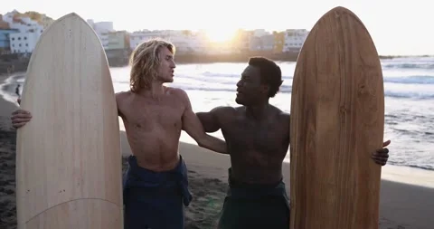 Multiracial surfer men having fun together on the beach - Extreme sport concept Stock Footage 151684988