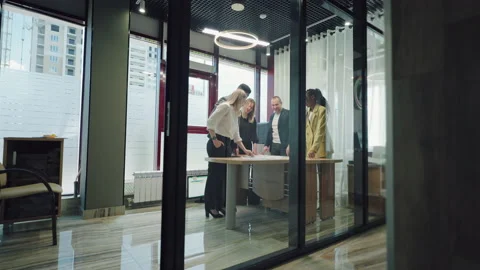 Multiracial team of specialists, managers and experts are meeting in office, for Stock Footage 208342722