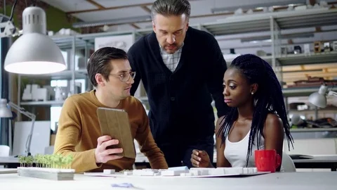 Multiracial team working in design and engineering architecture office. Stock Footage 85114444