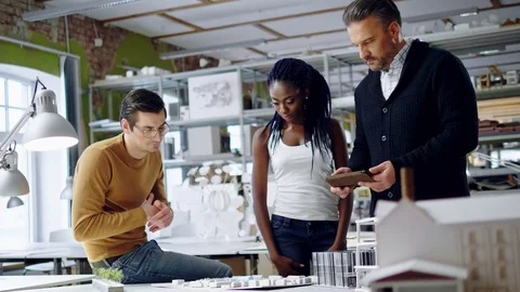 Multiracial team working in design and engineering architecture office. Stock Footage 85114465