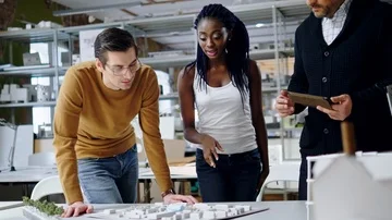Multiracial team working in design and engineering architecture office. Stock Footage 85877806