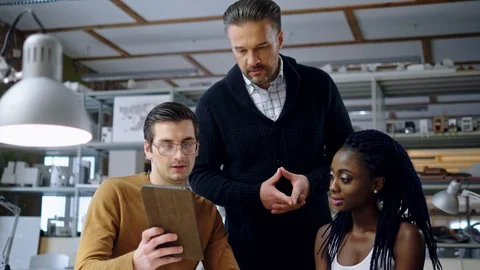 Multiracial team working in design and engineering architecture office. Stock Footage 85877879