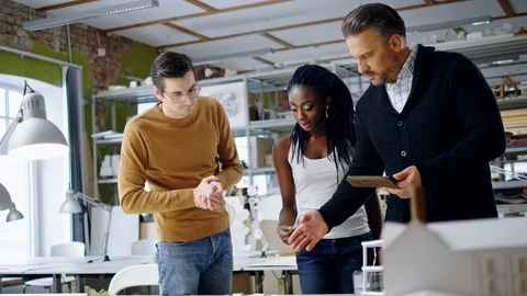 Multiracial team working in design and engineering architecture office. Stock Footage 86361884