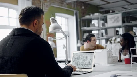 Multiracial team working in design and engineering architecture office. Stock Footage 86361926