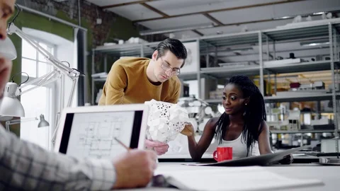 Multiracial team working in design and engineering architecture office. Stock Footage 86361928