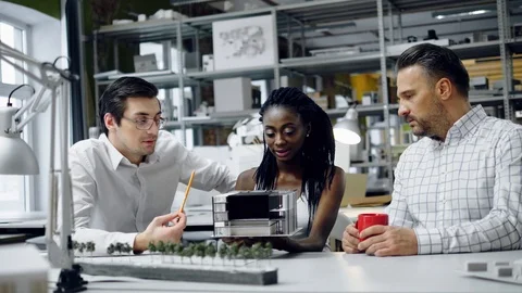 Multiracial team working in design and engineering architecture office. Stock Footage 86361935