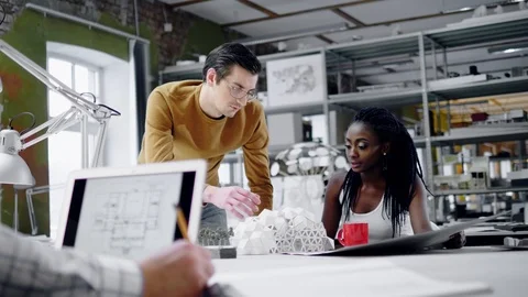 Multiracial team working in design and engineering architecture office. Stock Footage 86791745