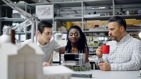 Multiracial team working in design and engineering architecture office Stock Footage 86792698