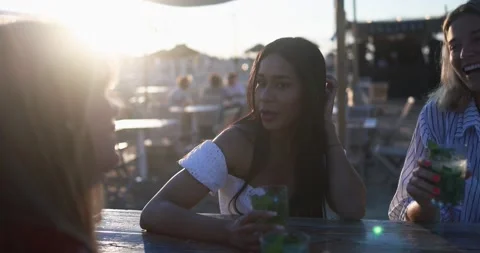 Multiracial women having fun drinking mojitos at beach party outdoor Stock Footage 199235095