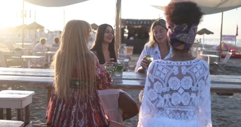 Multiracial women having fun drinking mojitos at beach party outdoor Stock Footage 199235154