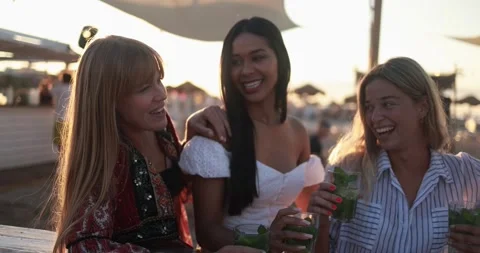 Multiracial women having fun drinking mojitos at beach party outdoor Stock Footage 199235224