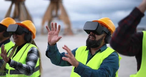 Multiracial workers using virtual reality headsets at industrial terminal Port Stock Footage 179975622