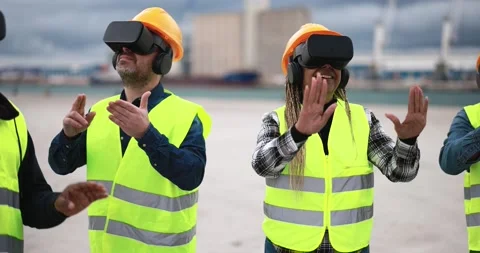 Multiracial workers using virtual reality headsets at industrial terminal Port Stock Footage 179975811