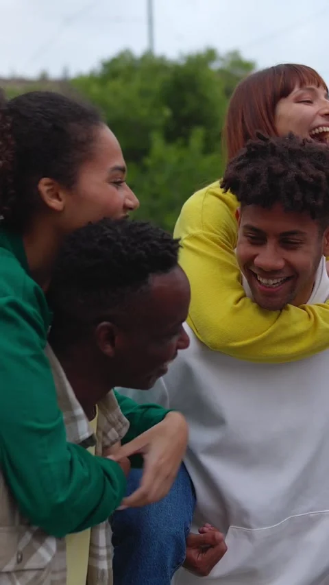 Multiracial young friends having fun together at city street. Stock Footage 272356771