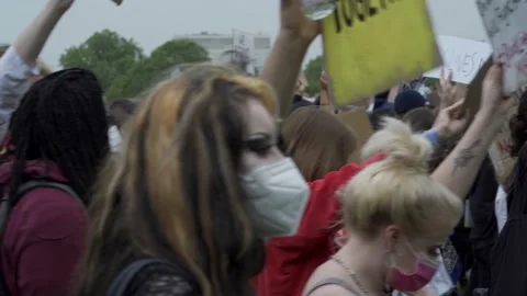 Multiracial young people marching for Black Lives Matter in London Stock Footage 131996618