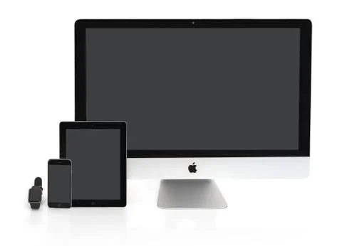 Multiscreen - Apple Watch, iPhone, iPad and iMac screens Stock Photos