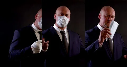 Multishot of a bald business man in a jacket, shirt and tie, he is talking on Stock Footage 128535769