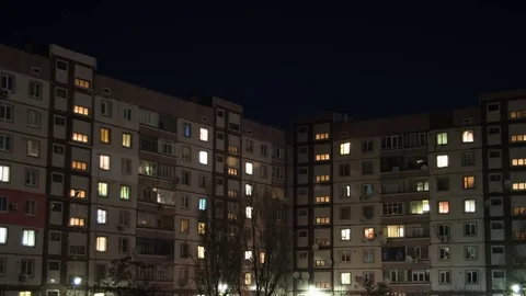 Multistorey Building With Changing Window Lighting At Night Stock Footage 70636404