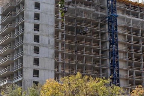 Multistoried, multi-floor building under construction. Industrial background. Stock Photos