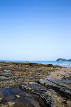Multistory layered rough and sedimentary rocks Foto stock