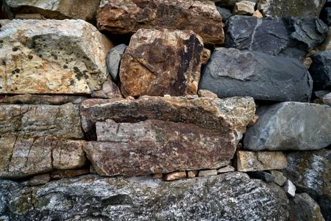 Multistory layered rough and sedimentary rocks Foto stock